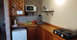 Complejo de apart y chalet con amplia pileta,  gran parque y vistas