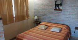 Complejo de apart y chalet con amplia pileta,  gran parque y vistas