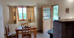 Complejo de apart y chalet con amplia pileta,  gran parque y vistas