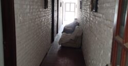 Importante esquina céntrica (ex hospedaje) con vivienda en Nono
