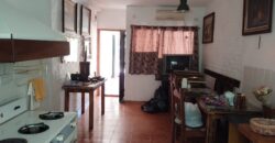 Importante esquina céntrica (ex hospedaje) con vivienda en Nono