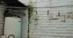 Importante esquina céntrica (ex hospedaje) con vivienda en Nono