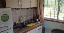 Amplio terreno con 3 viviendas, 2 piletas y vistas únicas en Las Calles
