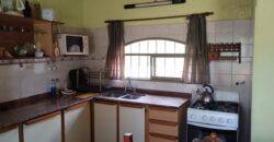 Amplio terreno con 3 viviendas, 2 piletas y vistas únicas en Las Calles