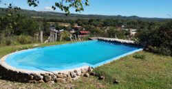 Importante inmueble con casa principal, departamentos, piscina e impactantes vistas en Nono