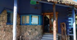 Importante inmueble con casa principal, departamentos, piscina e impactantes vistas en Nono